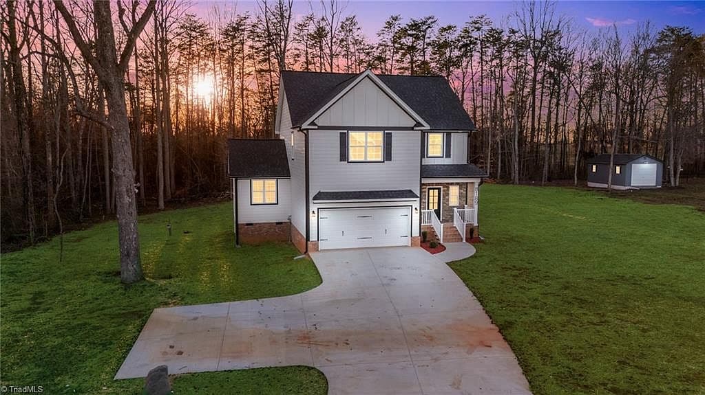 Browns Summit estate front elevation with stone accents